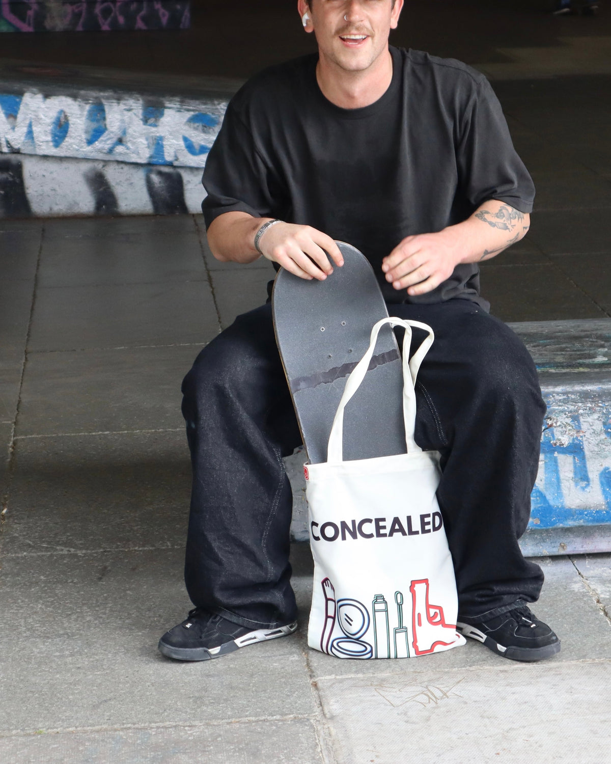 Concealed tote held on the lap with a skateboard