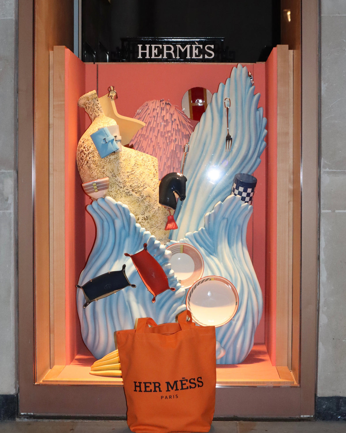 Her Mèss tote in a boutique window display